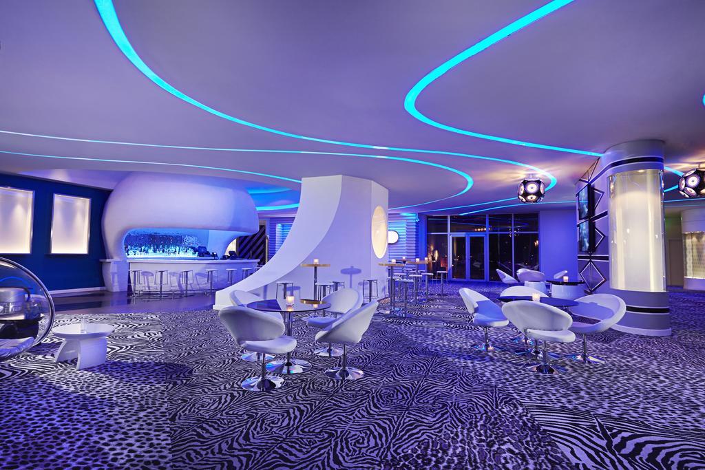 Megapolis Hotel Panama Exterior foto The interior of the W lounge at London Heathrow Airport